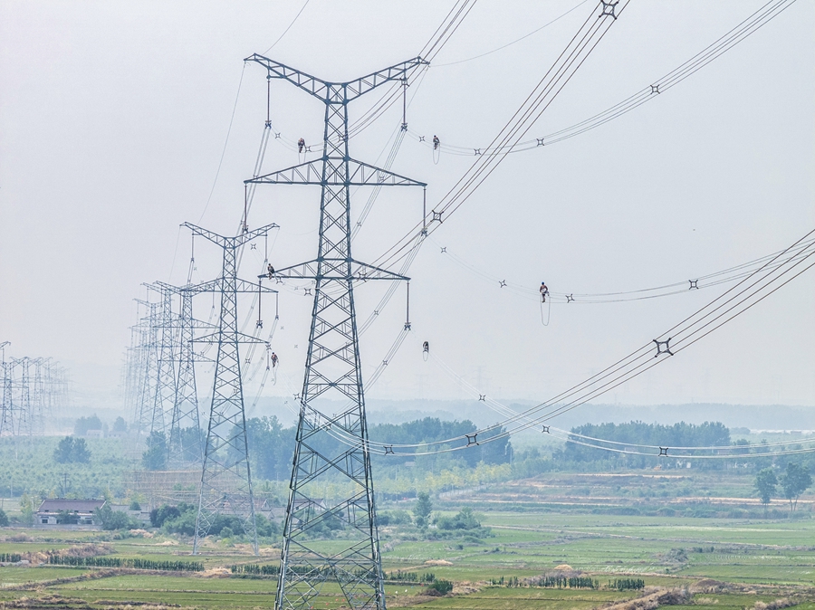 北電南送重點工程盱眙—秋藤線新建線路驗收。南京供電公司供圖